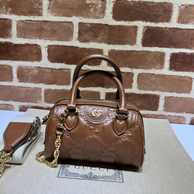G*u*i top handle bags